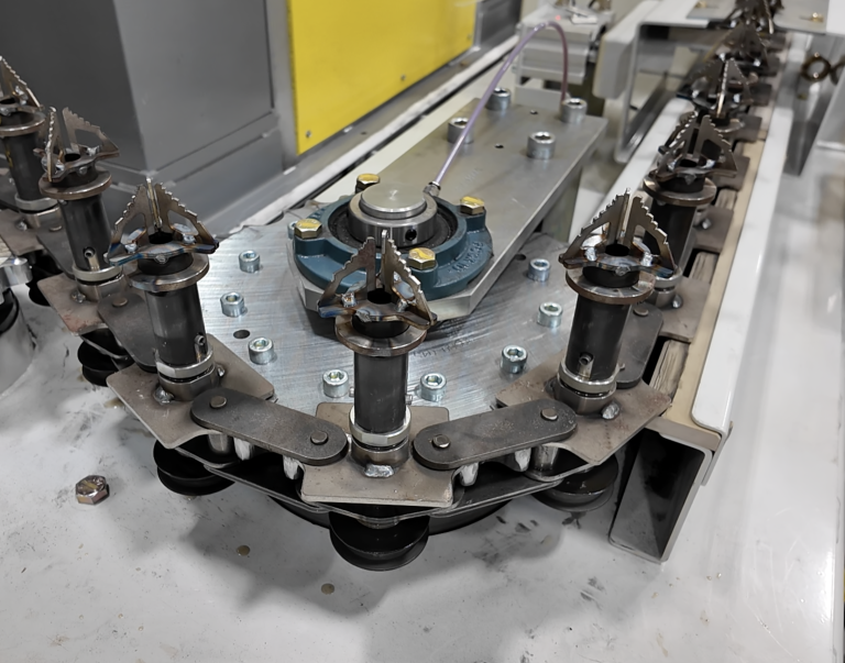 How a Centricity AR2000G Servo Indexer Drives a 2,135-Pound Chain-on-Edge Conveyor